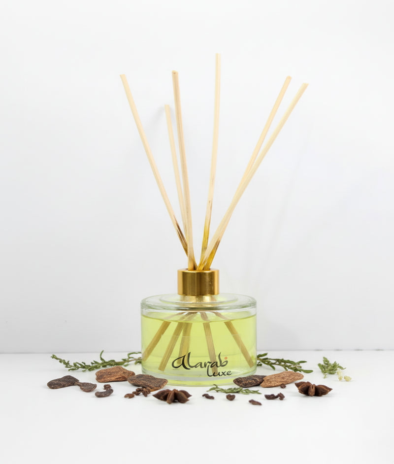 Scents of Wild Oud reed diffuser with rattan sticks, front view